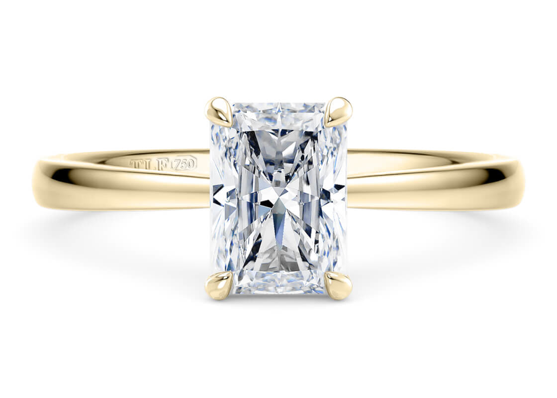 Baguette Cut Solitaire Engagement Ring Star Claw Set