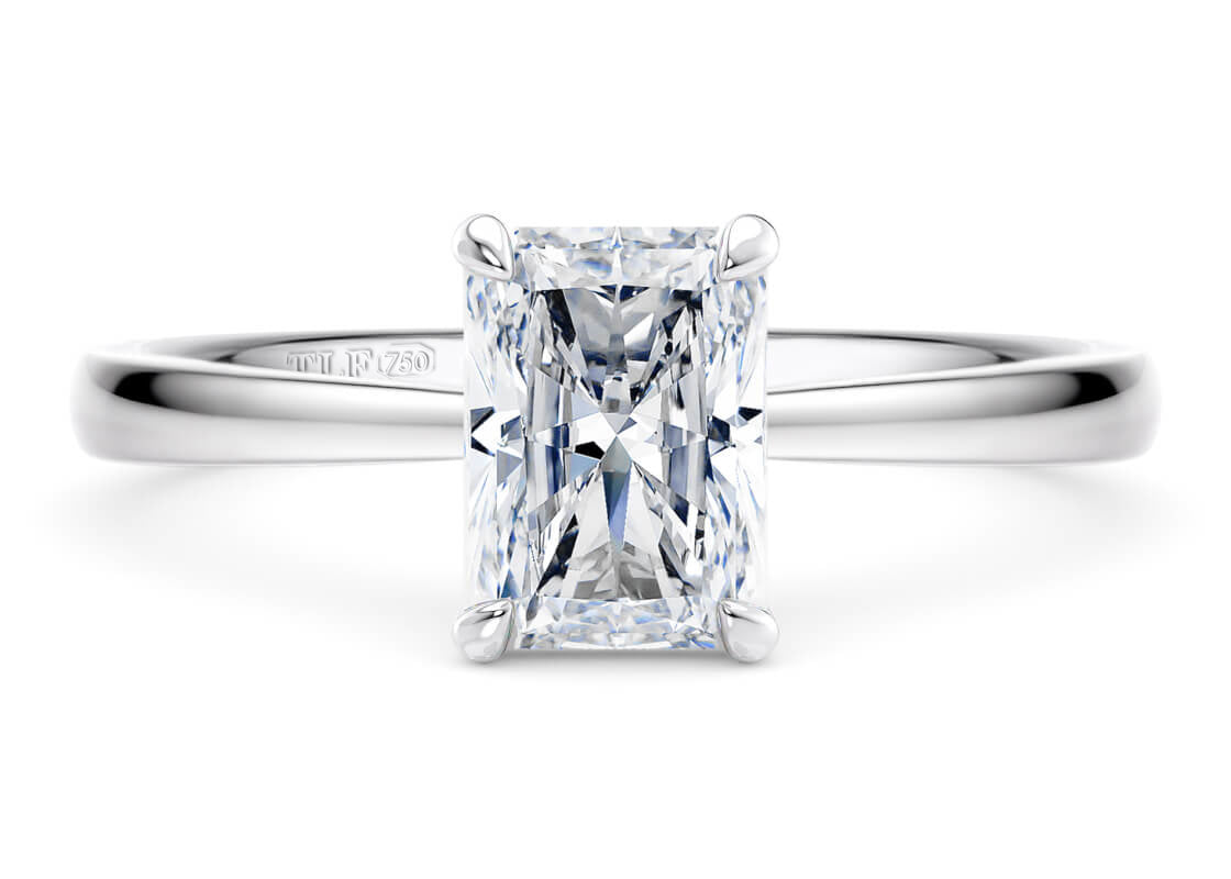 Baguette Cut Solitaire Engagement Ring Star Claw Set