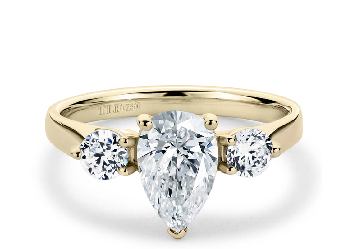 Pear Cut Solitaire Engagement Triple Claw Set