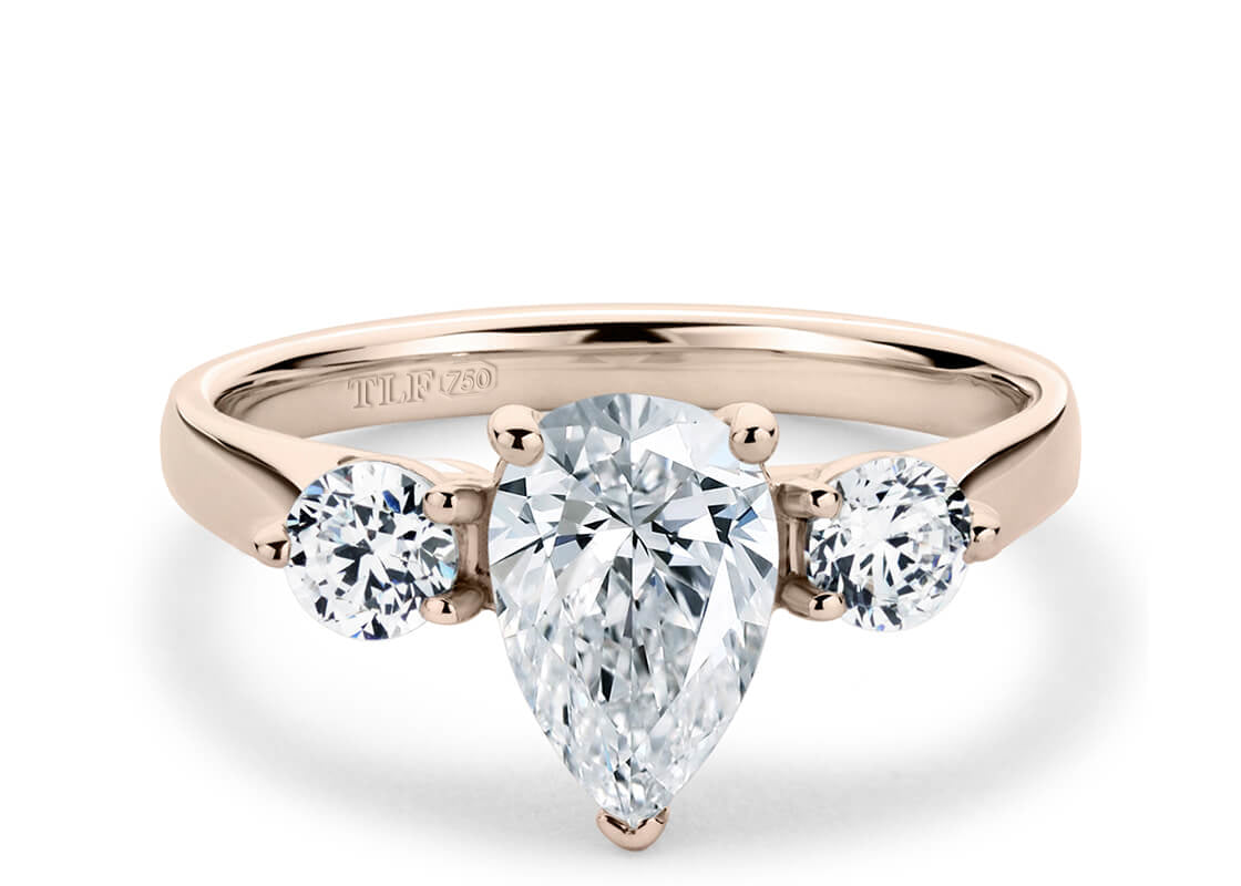Pear Cut Solitaire Engagement Triple Claw Set