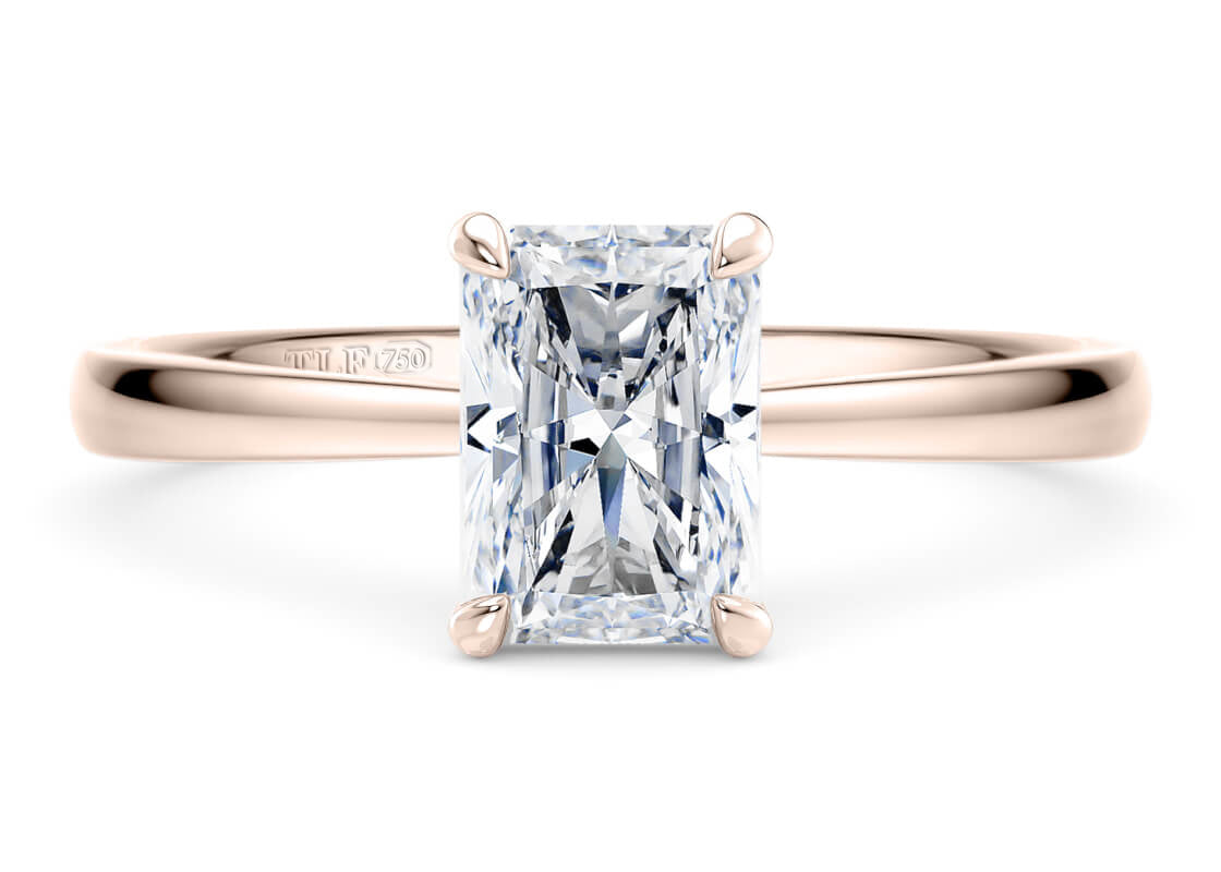 Baguette Cut Solitaire Engagement Ring Star Claw Set