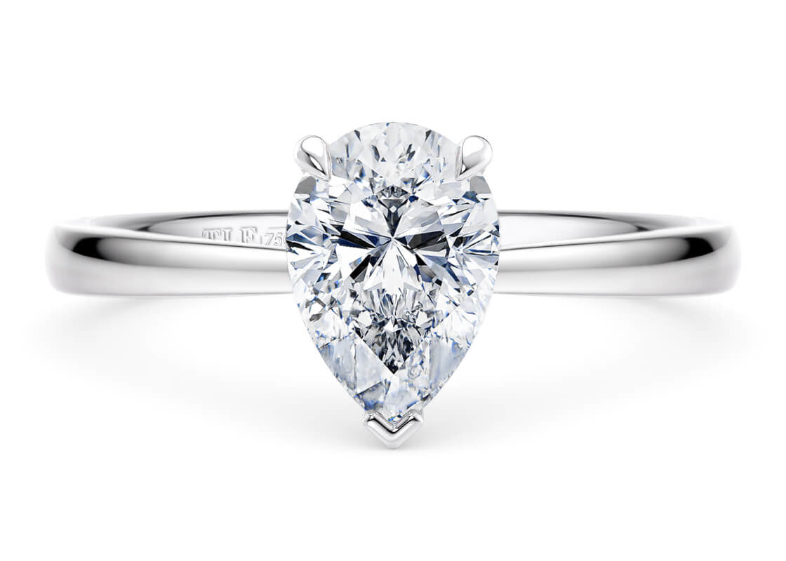 Pear Cut Solitaire Engagement Ring Quad Claw Set